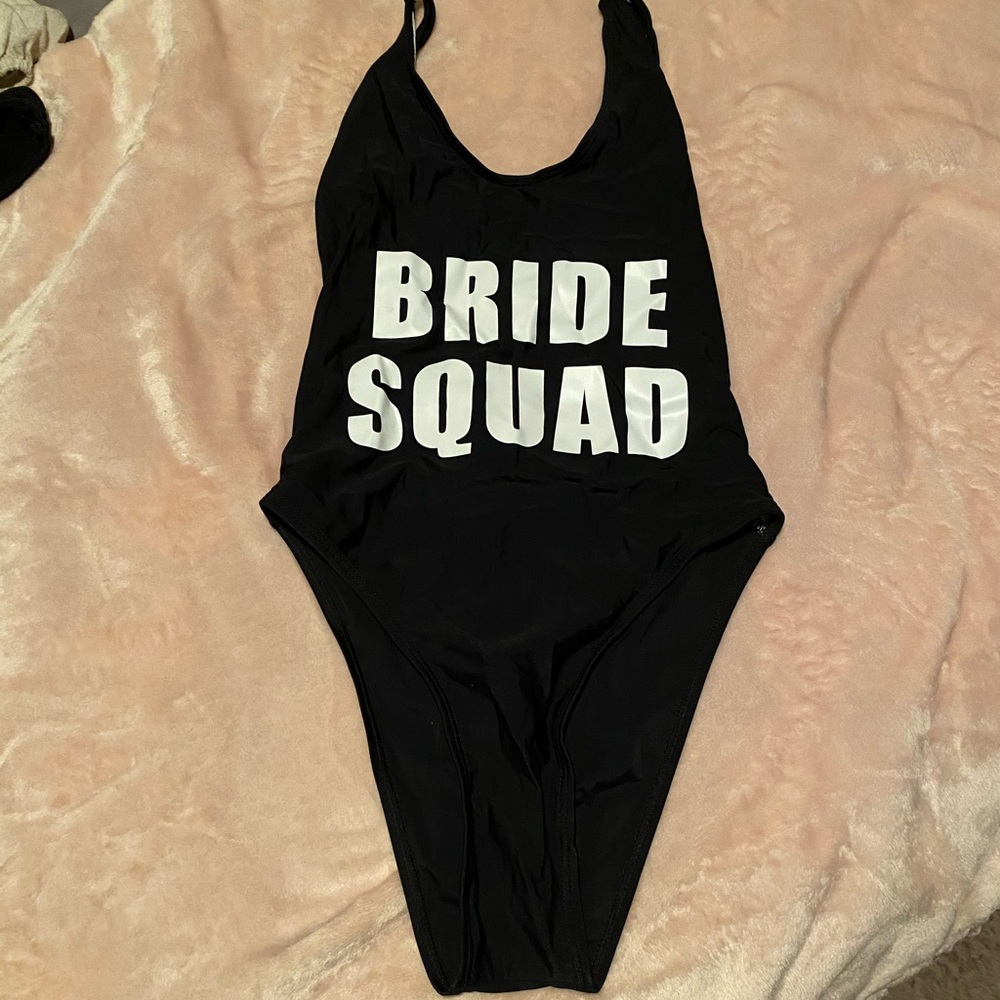 Bride squad swimsuit.